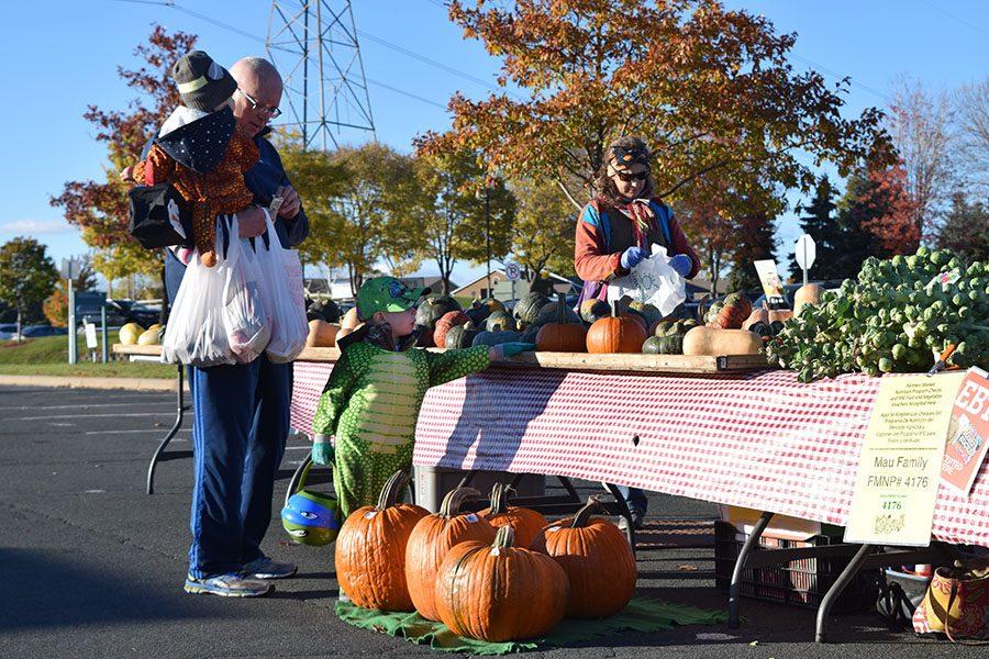 At the Maple Grove Farmers Market, kids of all ages dress up to participate in Halloween activities along with helping their parents shop for fresh produce on Oct. 20.