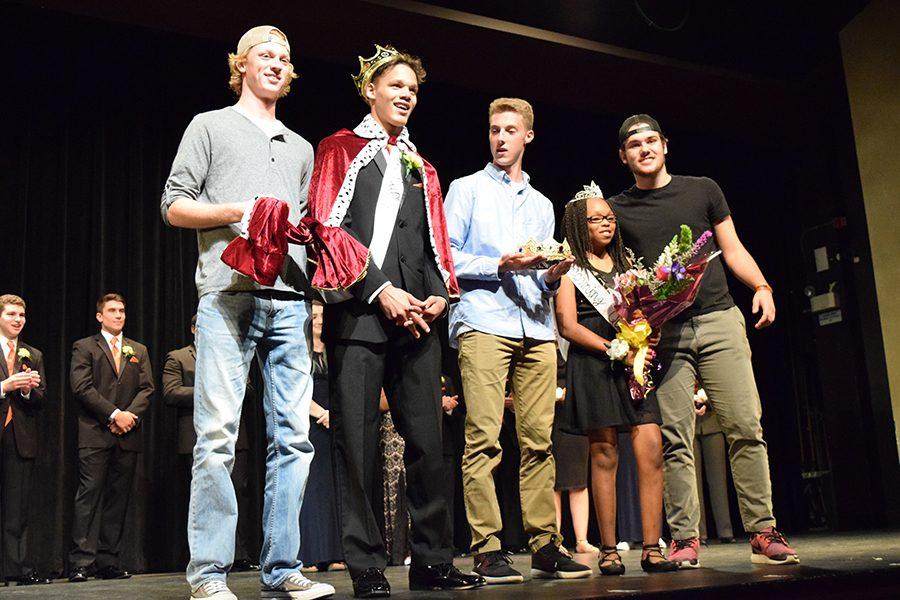 Seniors Connor Cornell, Devante Childress, Ryan Keith, Bre Dickens and Ryan Domers pose as the new Homecoming king and queens. Cornell, Keith and Domers fill in for homecoming king Riley Hannon who was not able to make it.