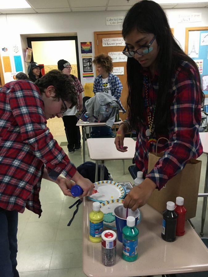 Senior GSA members Tehya Latchman and Elise Bargman celebrated National Coming Out Day Oct. 11 with face paint, glitter and a flannel dress code. T