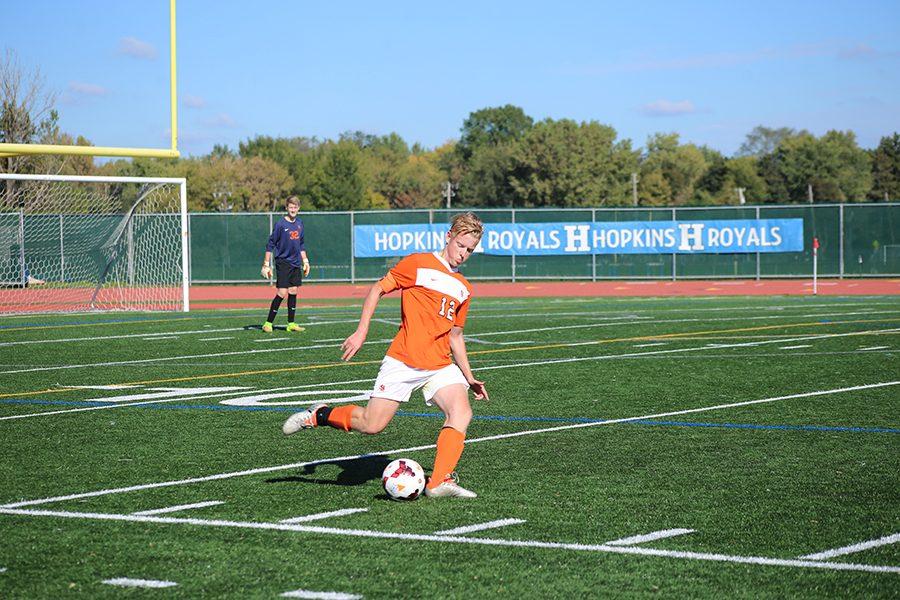 Senior Ian Lockhart plays defense against Hopkins at the boys soccer varsity game. St. Louis Park tied two to two against Hopkins Oct. 1. The next varsity game is a home game against rival school Benilde-St.Margarets Oct. 6 at 5pm.
