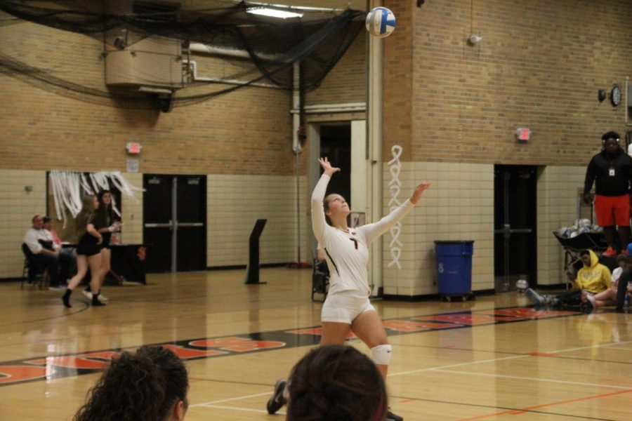 Junior Julia Austad serves the ball to the Burnsville Blaze on Monday, Oct. 10. The orioles lost the game 2-3. 