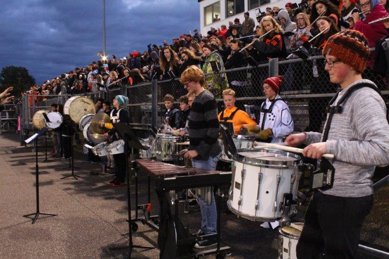 Percussionists perform before the Homecoming football game Oct. 7. Band students perform before the game, after each quarter and at the end of the game.