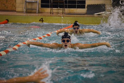 Freshman Hattie Kugler practices after school for girls' swimming sections. The team practices every day after school. 