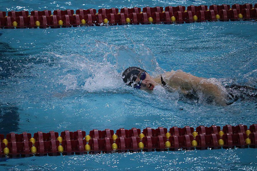 Eighth-grader Elizabeth Orton takes a breathe during the 500-yard freestyle on the first day of State. Orton finished 11th on the first day and 12th overall at the State finals on Friday.