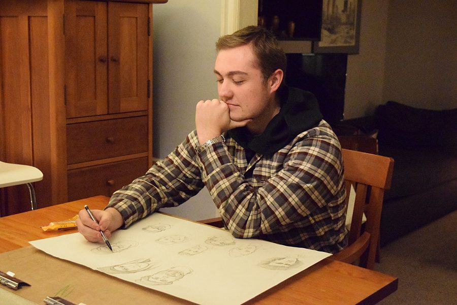 Senior Calvin Youngren sketches faces of random caricature-like people at his house to practice skills and prepare for his five hour class every Tuesday at the Minneapolis College of Art and Design Dec. 6.