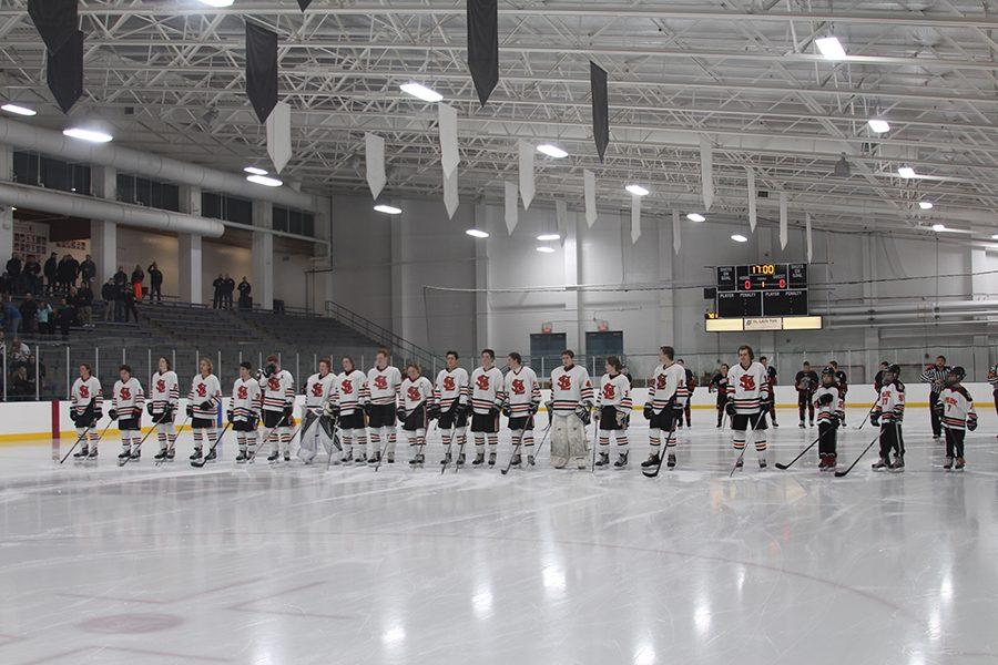 The players line up for the national anthem preceding the home varsity game against Osseo. Park defeated Osseo 10-0. The next game will be played on Sat. Dec. 10 at home.