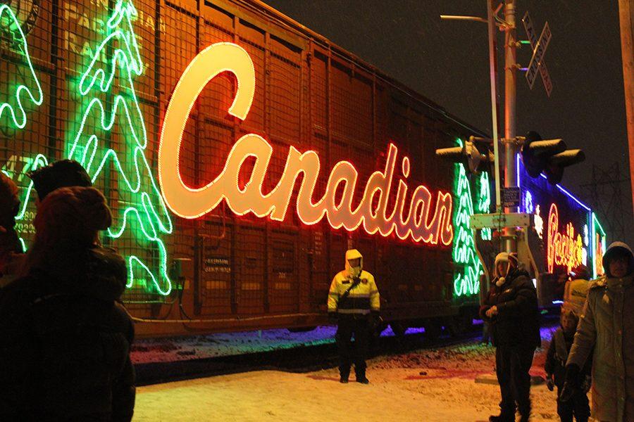 There are multiple security guards to ensure the safety all those who attended. The Holiday Train stops in 150 different cities each year. 