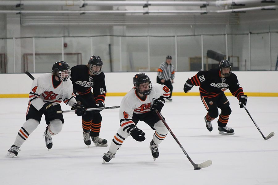 Senior Varsity Captain Bauer Neudecker scores two goals with 2 assists during the Varsity St. Louis Park High School Boys Hockey vs. Osseo High School on Tuesday Dec. 6, resulting with a 10-0 win for the SLP HS Varsity Boys Hockey team.