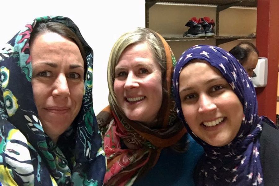 Founder Susan Niz and Allies of SLP memeber Kirsten Brekke Albright pose with a friend at the Islamic Northwest Community Center. Niz and Brekke Albright were invited to an Islamic prayer service, where they covered their heads with the Muslim hijab and learned more about Islamic virtues.