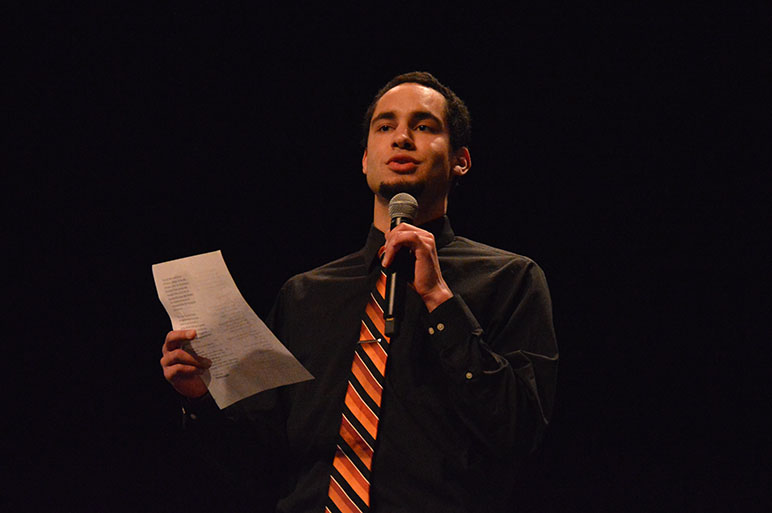 Chemistry teacher Alexander Polk recites his poem #TheStruggle at the Multicultural Show March 10. 