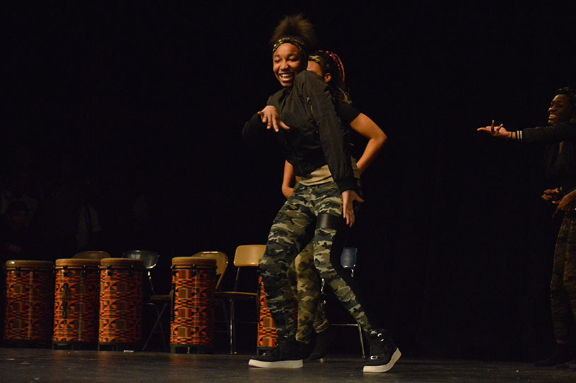 Freshman Cyntnia Owens dance to rap song Rolex by Ayo & Teo at the Multicultural show.  Owens performed with the dance group, Camo Girls