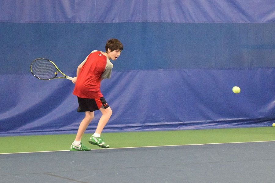 Freshman+Rafe+Covin+prepares+to+swing+at+the+ball+during+captains%E2%80%99+practice.+According+to+head+coach+David+Breitenbucher%2C+the+boys%E2%80%99+tennis+team+will+be+able+to+continue+having+both+a+JV+team+and+a+varsity+team+this+year+despite+low+numbers.