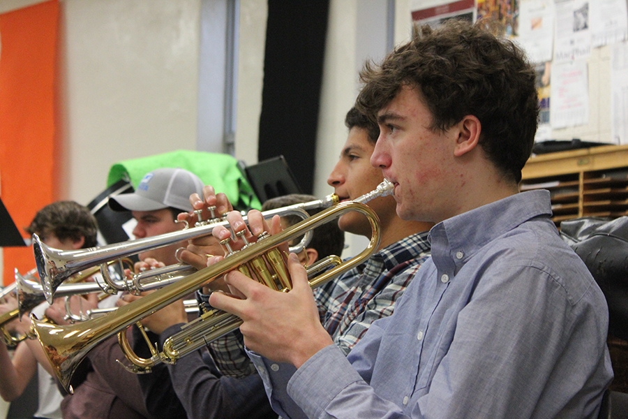 Sophomore Ben Klepfer practices the trumpet during second hour band April 26. Klepfer has played the trumpet for six years. 