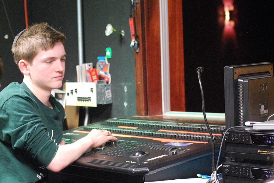Junior Jake Henry cues lights for the spring play rehearsal on April 25. The spring play, Sense and Sensibility, plays on April 28 and 29 at 7 p.m. It shows April 30 at 2 p.m.