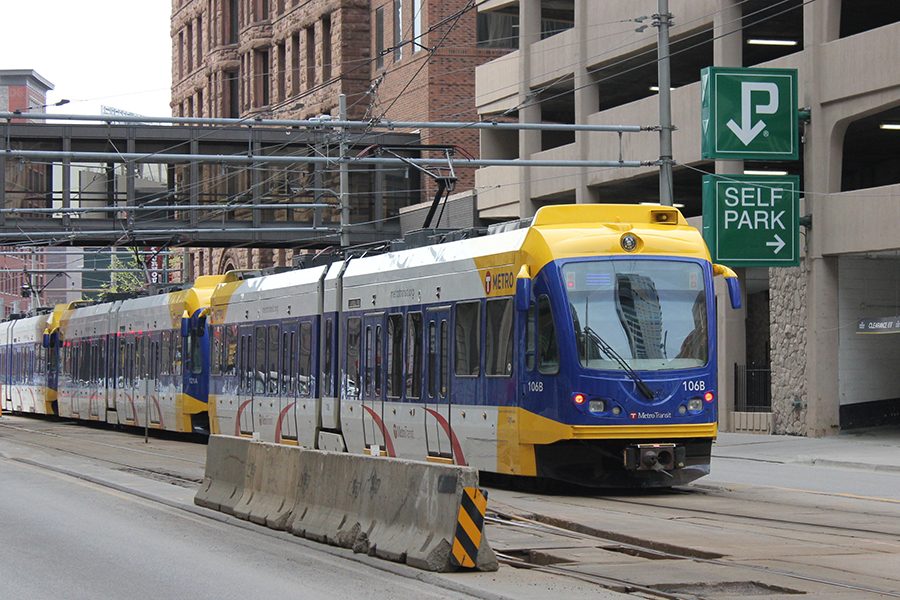 The blue line light rail moves down 5th St in downtown Minneapolis on April 22.