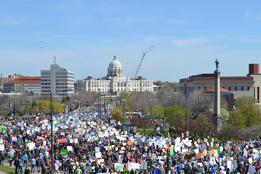 Minnesotans gather to promote science and protest Trumps budget cuts for science agencies, April 22.
