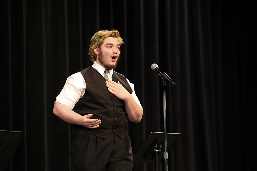 Senior Kaleb Schweizer opens up the 2016-2017 Senior Vocal Recital on May 22, with the song Be Our Guest by Alan Menken from the original movie The Beauty and the Beast.