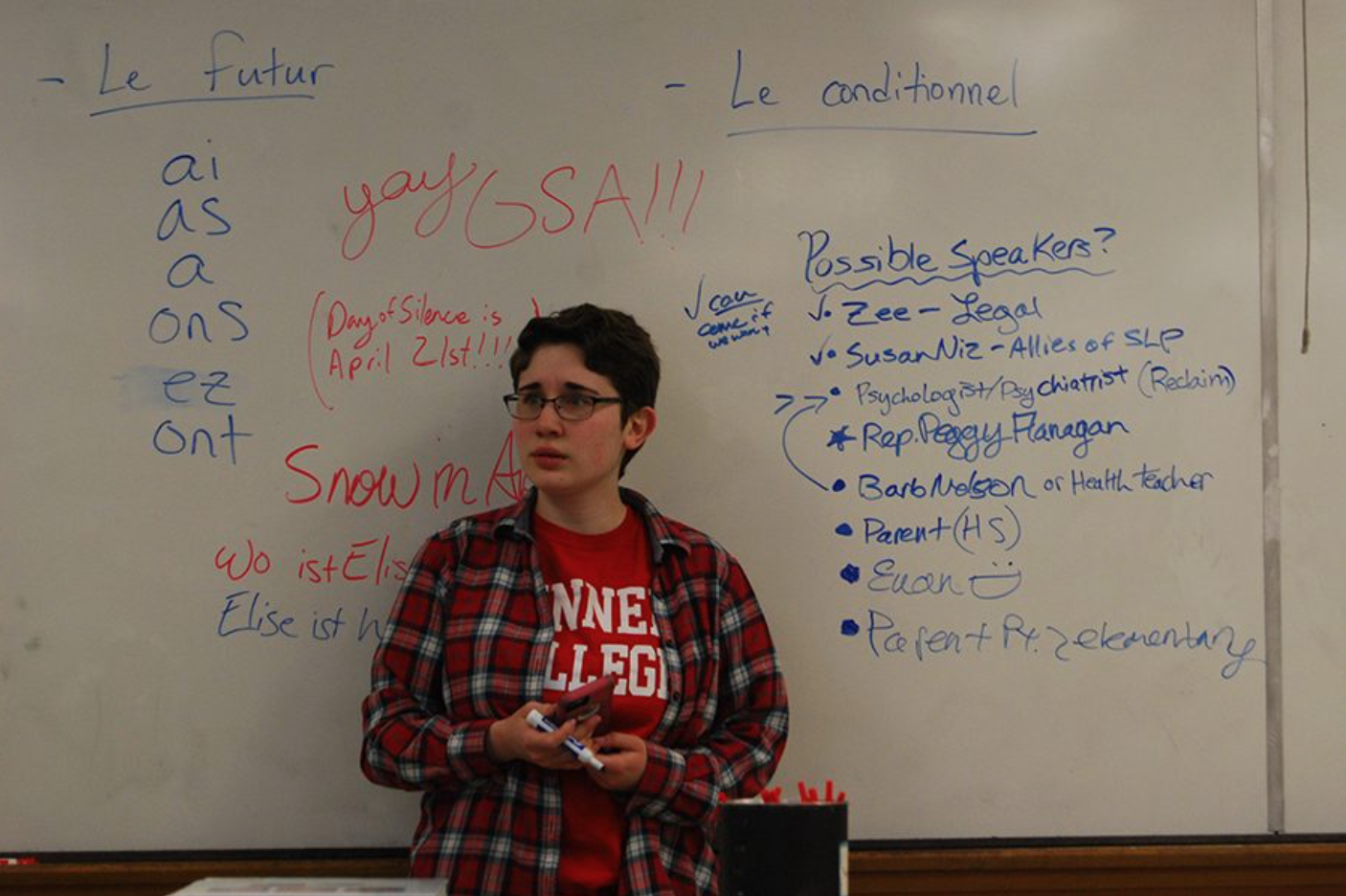 Senior Elise Bargman discusses possible speakers for a School Board open forum during a Gender Sexuality Alliance meeting. 