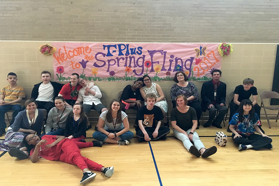 Special education students and teachers pose for a photo during a Spring Fling dance May 12 during the school day. Transition Plus, a special needs program for ages 18-21, hosted the dance.