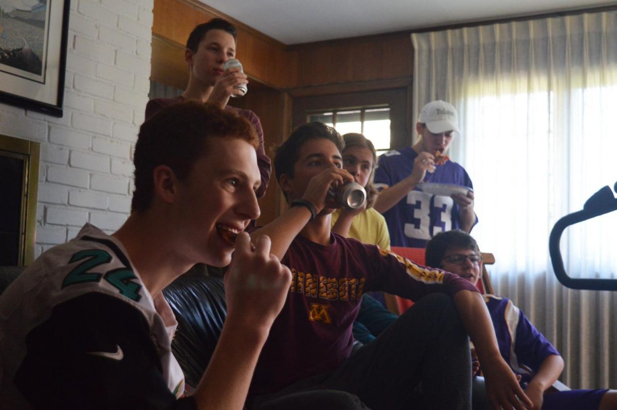 Students watch the Vikings-Steelers game cheering for their fantasy football team. Sept. 17
