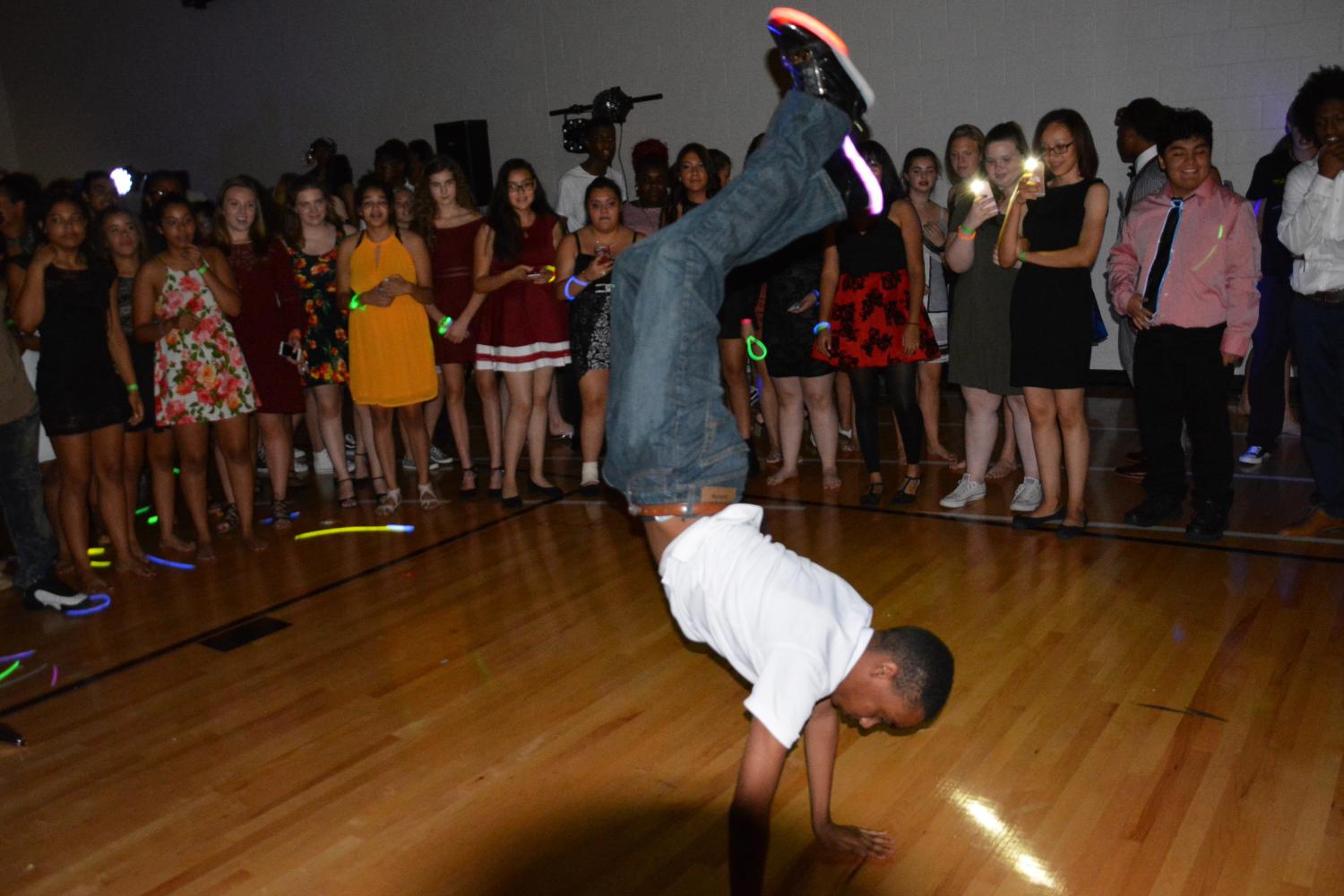 Park student breakdances during the homecoming dance held in the field house, Sept. 16.