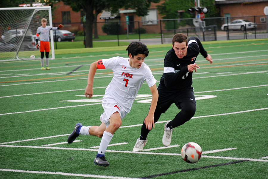 Senior captain Anthony Brandel plays defense against the New Richmond boys soccer team. This is Brandels third year on the varsity team and his second year as a captain.