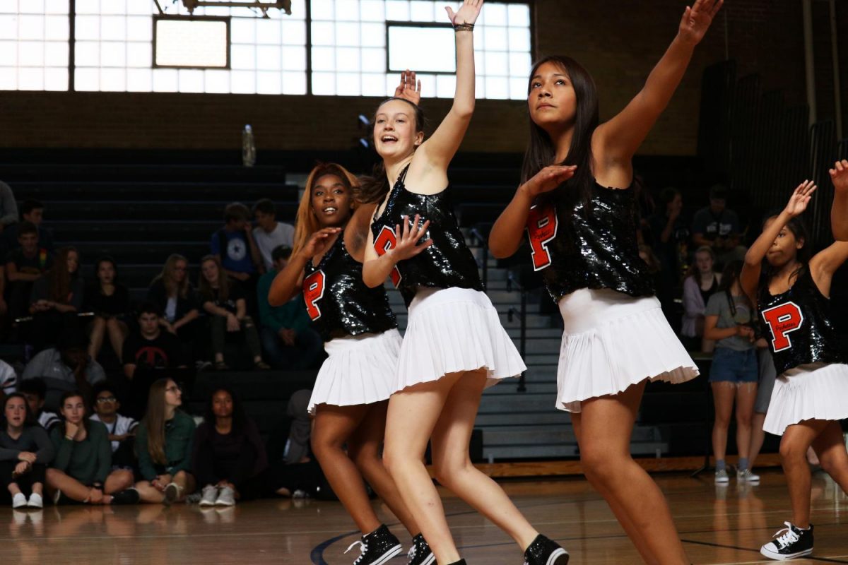  The Parkettes perform a dance routine at the second homecoming pepfest. They also helped the student section cheer on Park at the homecoming football game Sept. 15.
