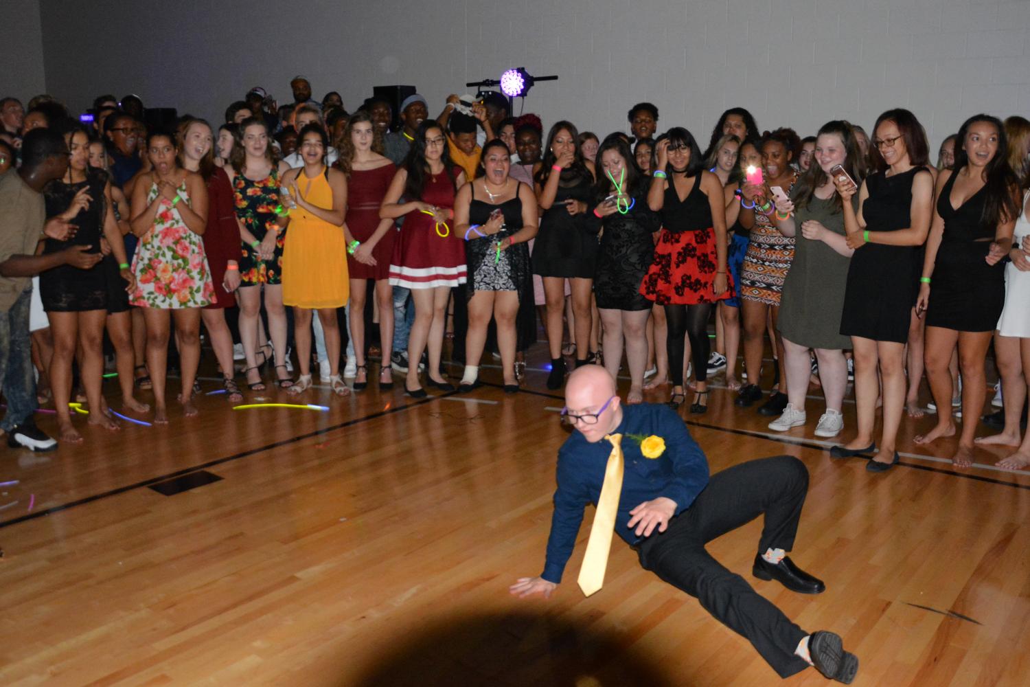 Homecoming king Terrance OBrien breakdances during the homecoming dance, Sept. 16.