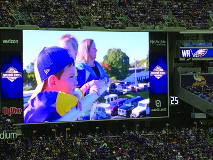 Wyatt and Shawn Mathews displayed as part of a tribute video made in honor of Officer Bill Mathews during a stoppage in play at U.S. Bank Stadium Oct. 15. Wayzata to the Wall will honor officer Mathews and raise money for the departments trip to Washington D.C.