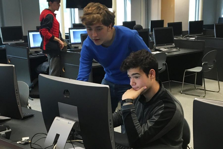 Sophomores Cole Nugteren and David Prohofsky begin to work on the basics of building a robot. The robotics club meets at 3:15 p.m. on Tuesdays in room C350. 