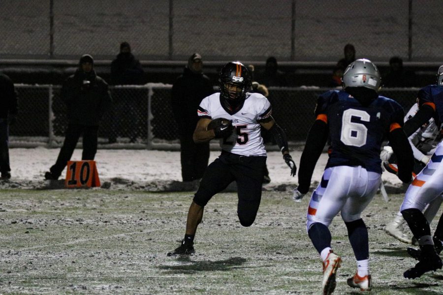 Junior AJ Datt carries the ball to the edge of the field in an attempt to gain yardage. Park upset the first seed Cooper 13-12 in the Section finals.