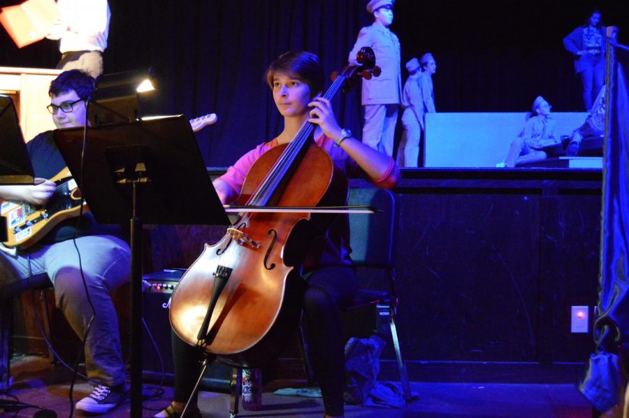 Junior Greta Long plays the cello during a Big Fish rehearsal. Pit orchestra performed for both weekends of the musical.