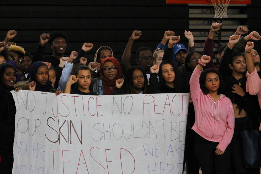 Students gathered in the old gym to protest recent events in the Champlin Park school district. Seniors Doreen Moranga and Ambriya Reese helped organize the demonstration.