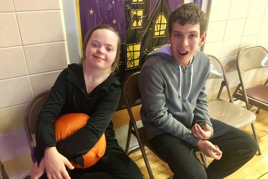 Sophomores Monica Smigleski and Edan Cherrill partake in the Halloween festivities at a dance hosted by Transition Plus Oct. 27. Transition Plus hosts two dances a year for the Special Education programs in the districts it serves.