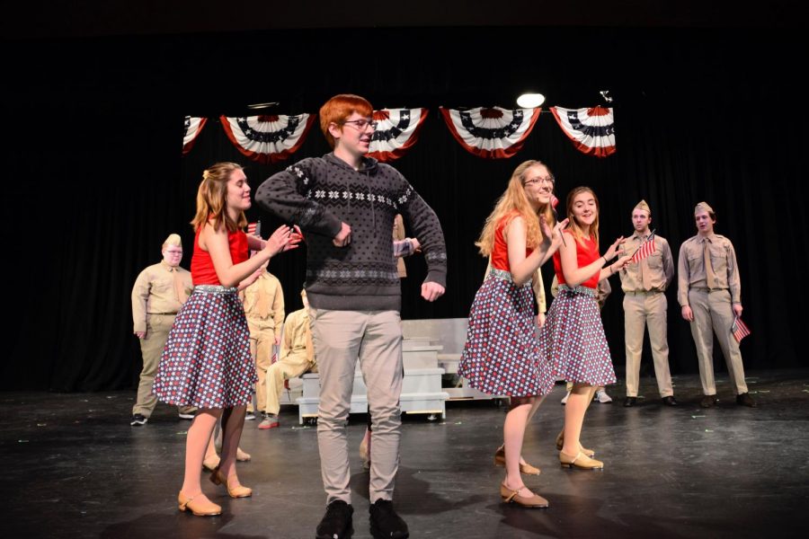 Senior film club president Ben Romain rehearses his role of Young Edward Bloom in the fall theater production Big Fish. Film club presidents all have roles in the play, preventing them from holding film club meetings.