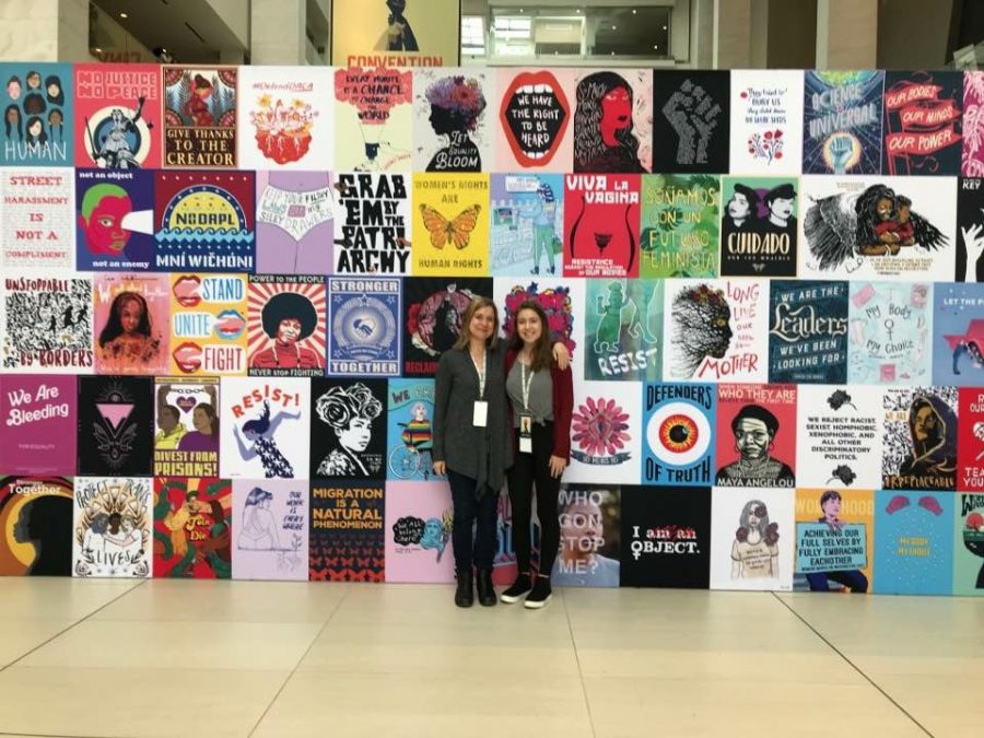 Eva Goldfarb and her mother Elena Temple pose in front of display at the Womens Convention on October 27, 2017