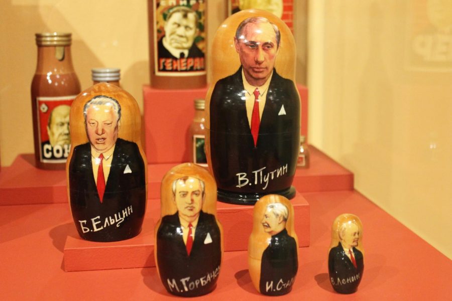 A nesting doll set from the Matryoshka Nesting Doll exhibit features prominent Russian political figures from Russia like Lenin, Stalin, Gorbachev, Yeltsin, and Putin.