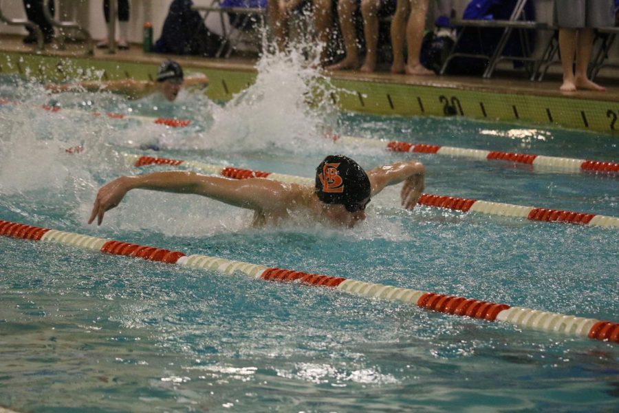 Senior Luke Anderson competes in butterfly during a meet against Bloomington Jefferson. Anderson recently committed to continue swimming at the University of St. Thomas next year. 