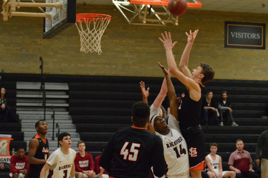 Senior Aidan Doherty jumps to snatch the ball before richfield player. Park defeated Richfield 93-59.