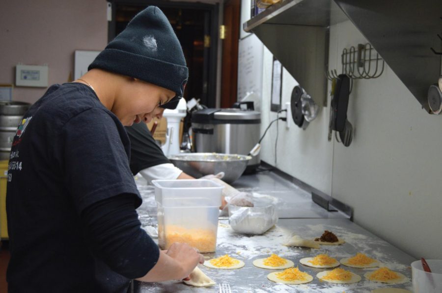 Seniors Samantha and Sam Garcia work on making authentic food, native to their culture for their family owned restaurant Conga Latin Bistro. The restaurant is located on Hennepin Ave. in Minneapolis, it is open everyday from 5 p.m. to 2 a.m..