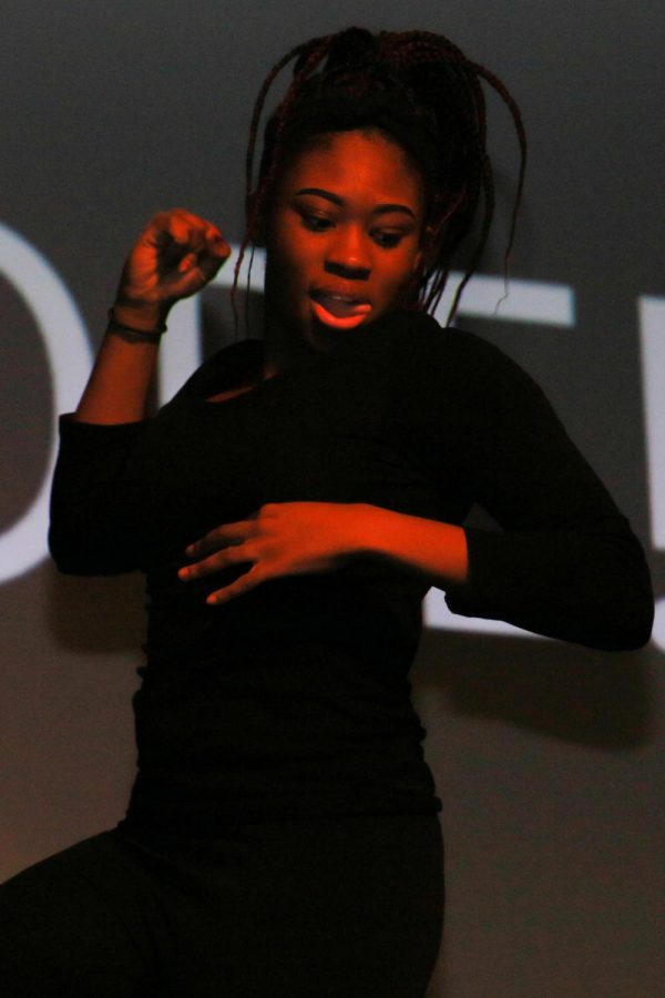 Shaniah Blair dances during the opening scene of the Black History Month performance. 