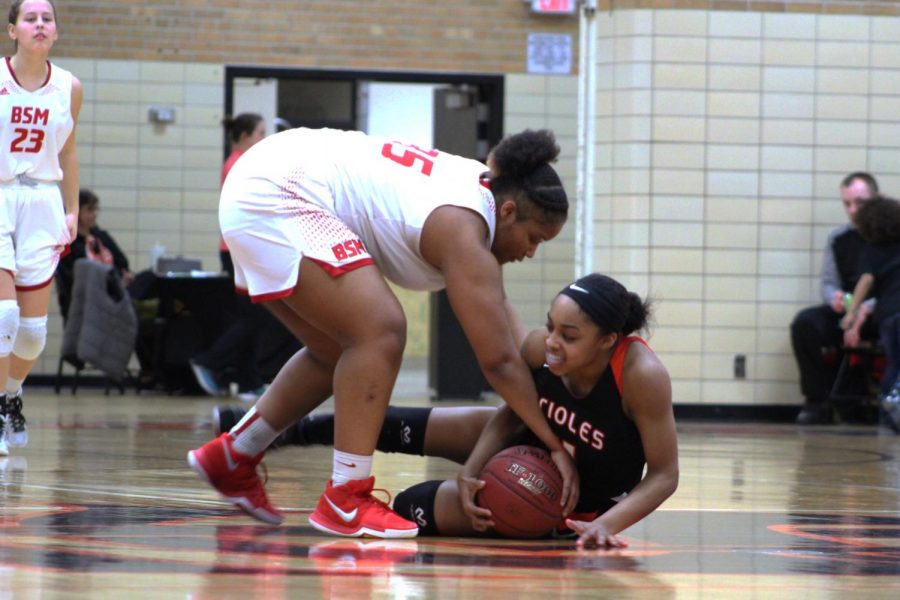 Senior Tejah Hayden fights for control over the ball on Feb. 23. Park beat Benilde 66-45.