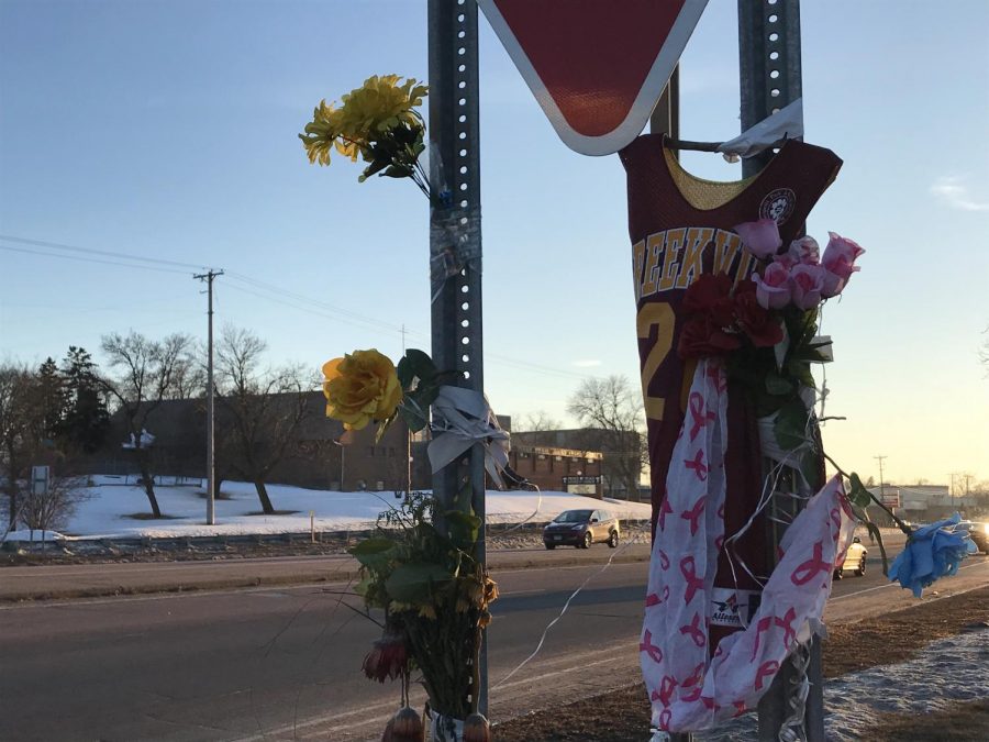 A yield sign is decorated alongside Highway 7 and Texas Avenue in honor of Hopkins freshman Daunte Moore.