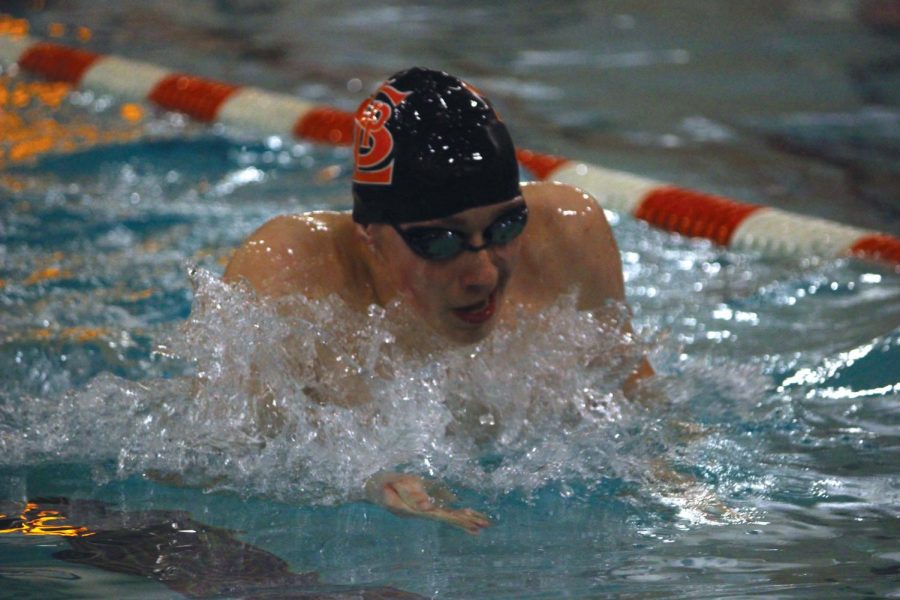 Junior Luke Anderson swims the breaststroke during practice in preparation for State competition March 3.   Anderson attended this years State competition for the first time, swimming the 100 backstroke.