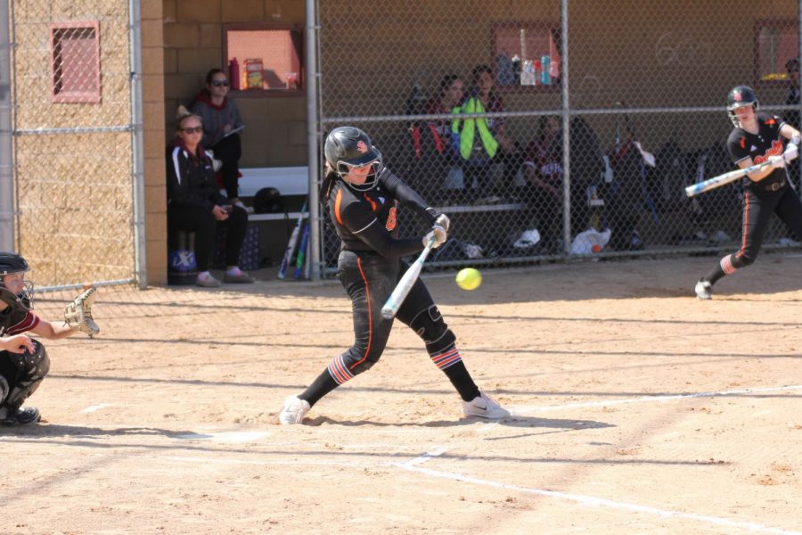 Junior Maddy Schmitz takes a swing during the varsity softball game against Richfield during the top of the second April 28. Park won 3-1. 