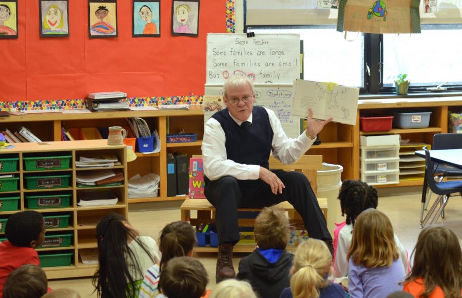 Susan Lindgren principle Frank Johnson reads a Shel Silverstein poem to kindergartners. This is Johnsons last year as a principle, as he is retiring later in the spring.