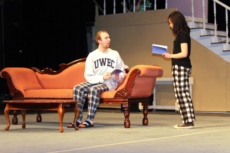 Senior Ian McIntyre and junior Zoey Zachek rehearse a scene from the spring play, The Philadelphia Story. Theatre will perform The Philadelphia Story 7 p.m. April 27-28 and 2 p.m April 29.