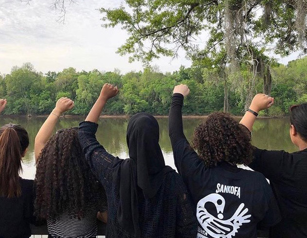 Students raise their fists on the Edmund Petus Bridge in Selma, Alabama. Park students traveled to Alabama and Tennessee for a Civil Rights Research Experience (CRRE) April 4 to 7.