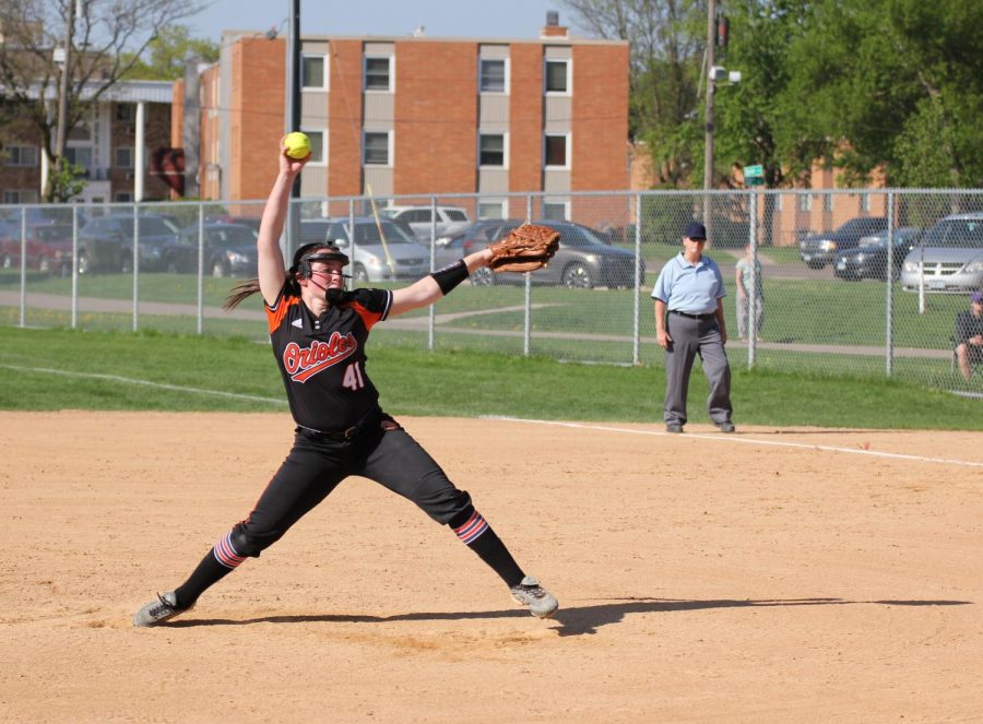 Senior Annabelle Schutte pitches to a Benilde batter May 16. Varsity softballs record is 10-10. 
