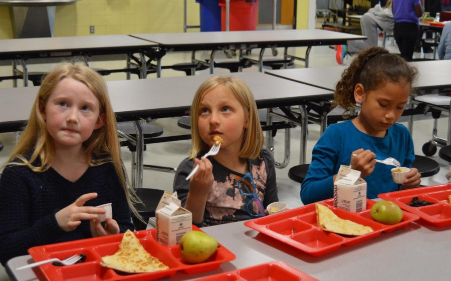 Students taste test parmesan cauliflower during their lunch at Aquila Elementary School. 